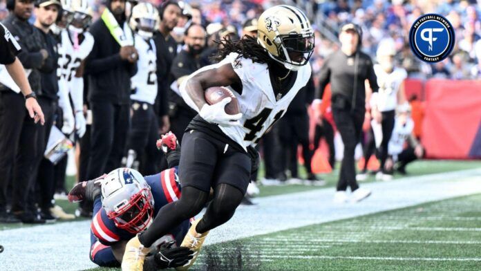 New Orleans Saints running back Alvin Kamara (41) breaks a tackle from New England Patriots linebacker Ja'Whaun Bentley (8) during the second half at Gillette Stadium.