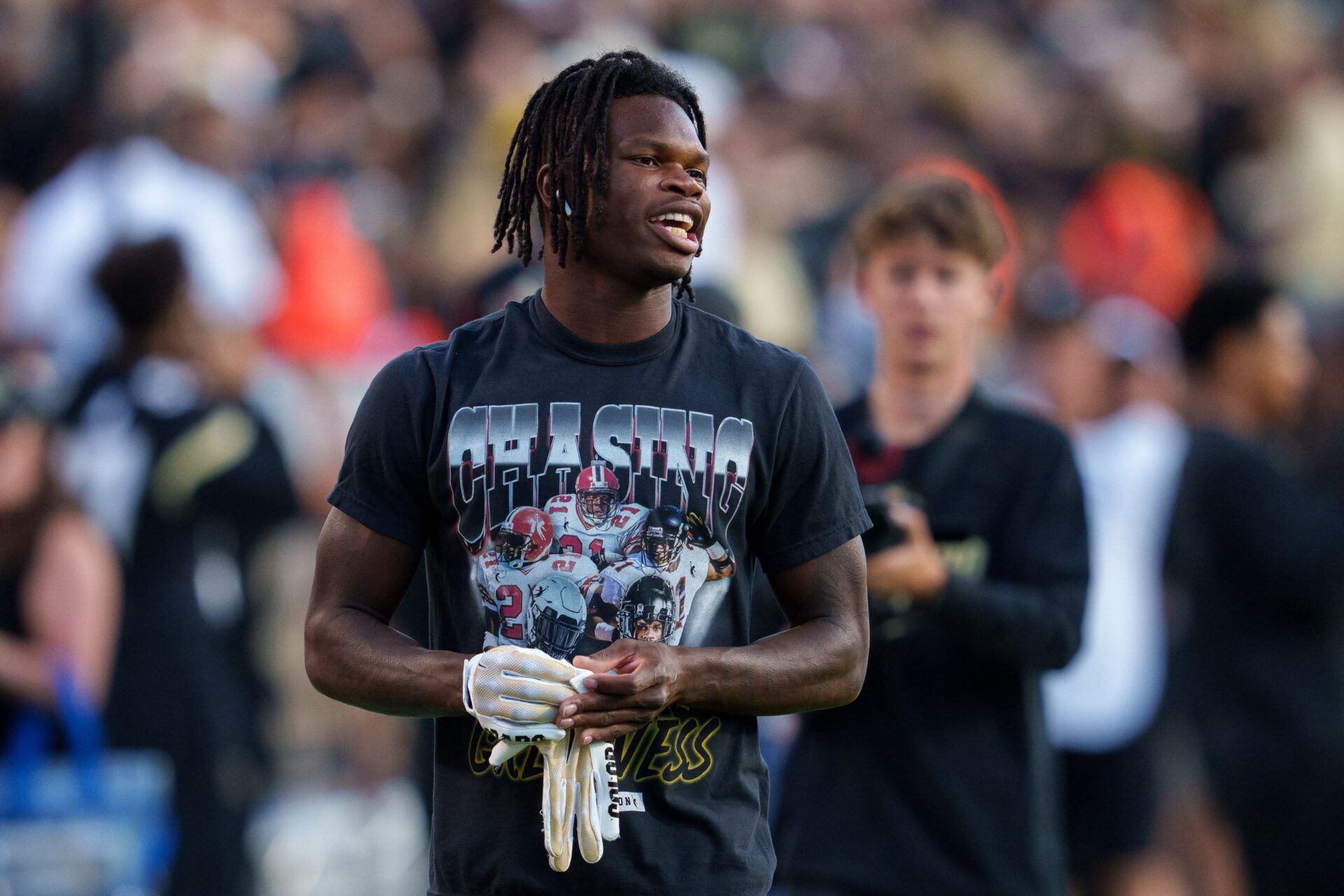 Colorado Buffaloes CB Travis Hunter (12) warms up prior to the game against the Colorado State Rams.