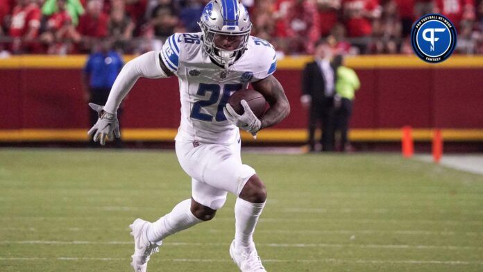 Detroit Lions running back Jahmyr Gibbs carries the football.