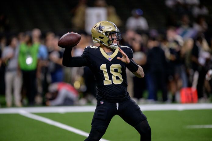 Oct 13, 2024; New Orleans, Louisiana, USA; New Orleans Saints quarterback Spencer Rattler (18) warms up before a game against the Tampa Bay Buccaneers at Caesars Superdome. Mandatory Credit: Matthew Hinton-Imagn Images