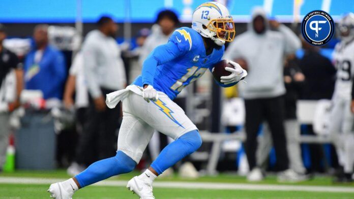 Los Angeles Chargers wide receiver Keenan Allen (13) runs the ball against the Las Vegas Raiders during the first half at SoFi Stadium.