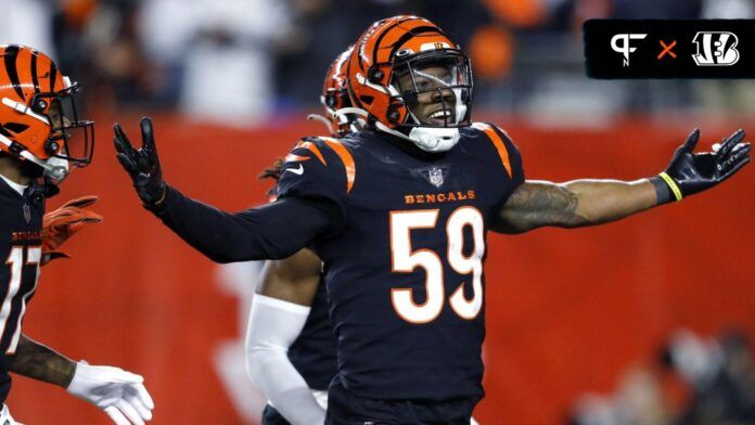 Akeem Davis-Gaither (59) celebrates during the second half against the Baltimore Ravens in the first half in a wild card game at Paycor Stadium.