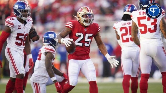 Elijah Mitchell (25) reacts after rushing for a first down against the New York Giants in the second quarter at Levi's Stadium.