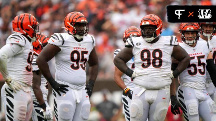 Zach Carter (95) and Cincinnati Bengals defensive tackle DJ Reader (98) and the Cincinnati Bengals defense walk up to the line of scrimmage for a snap in the third quarter.