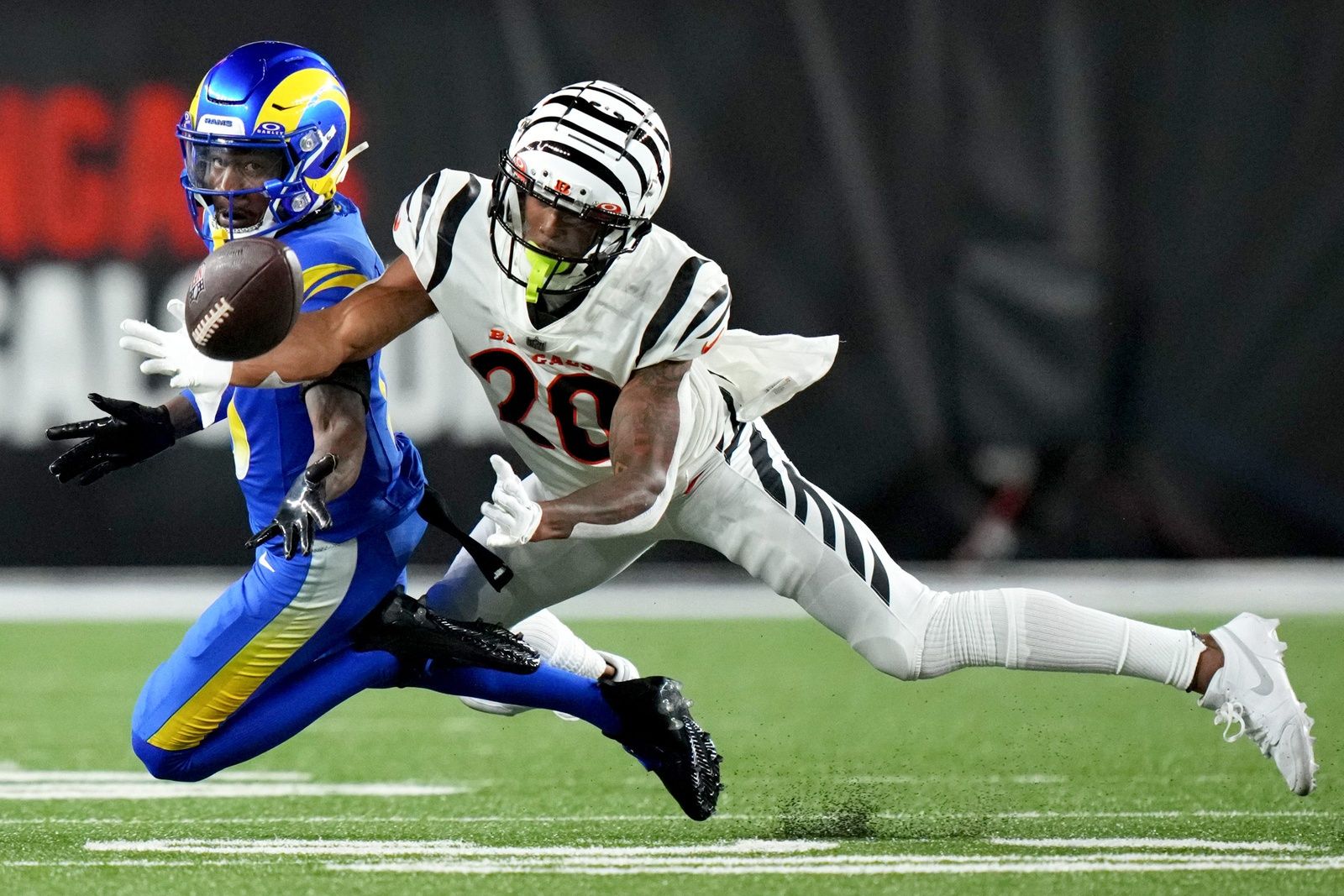 DJ Turner II (20) defends a pass intended for Los Angeles Rams wide receiver Tutu Atwell (5) in the fourth quarter during a Week 3 NFL football game between the Los Angeles Rams and the Cincinnati Bengals.