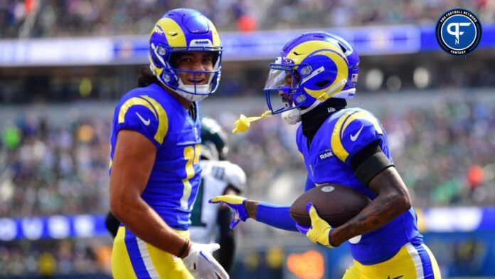 Tutu Atwell (5) celebrates his touchdown scored against the Philadelphia Eagles with wide receiver Puka Nacua (17) during the first half at SoFi Stadium.