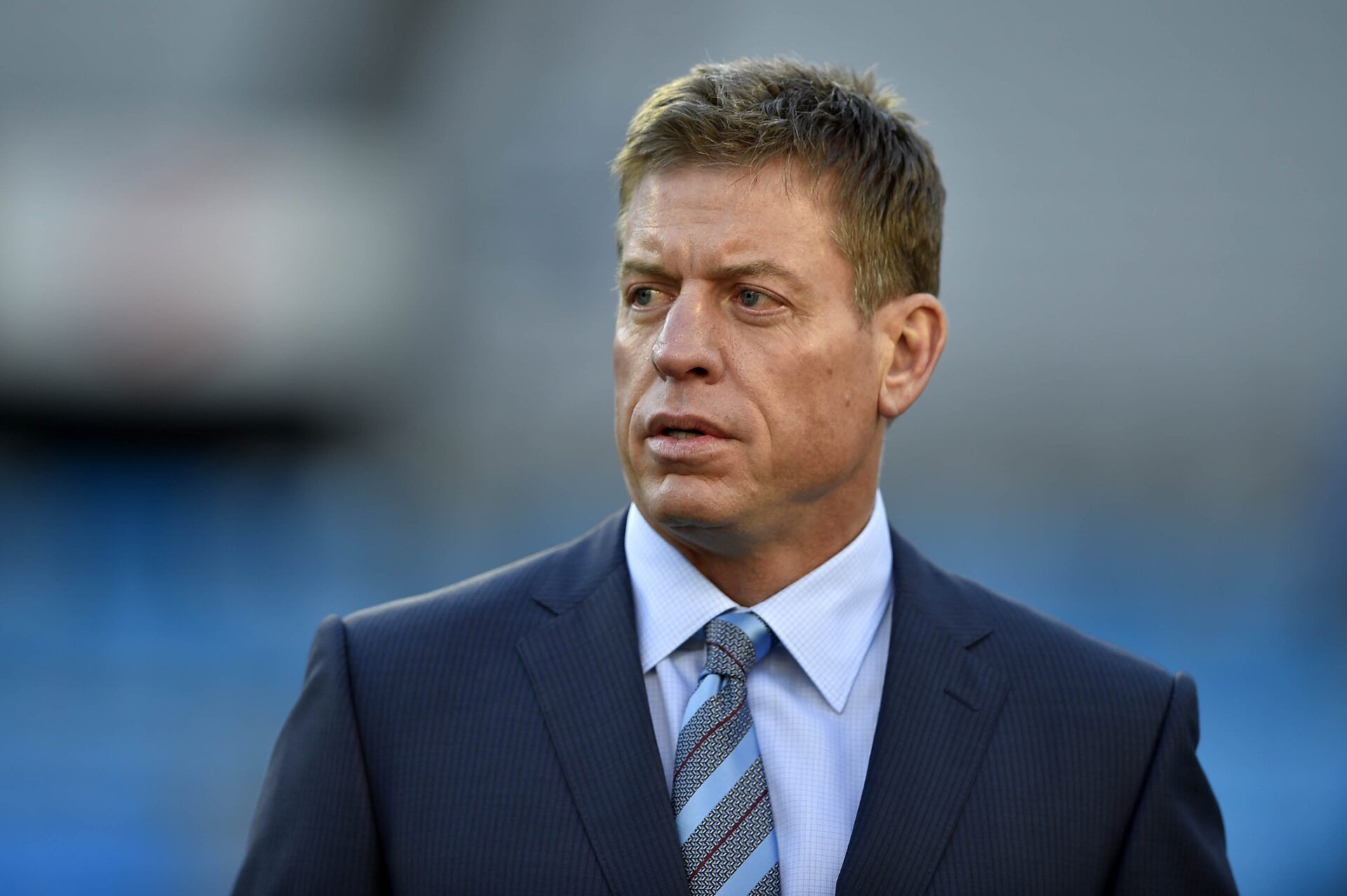 Troy Aikman on the field before the game between the Carolina Panthers and the Arizona Cardinals in the NFC Championship football game at Bank of America Stadium.