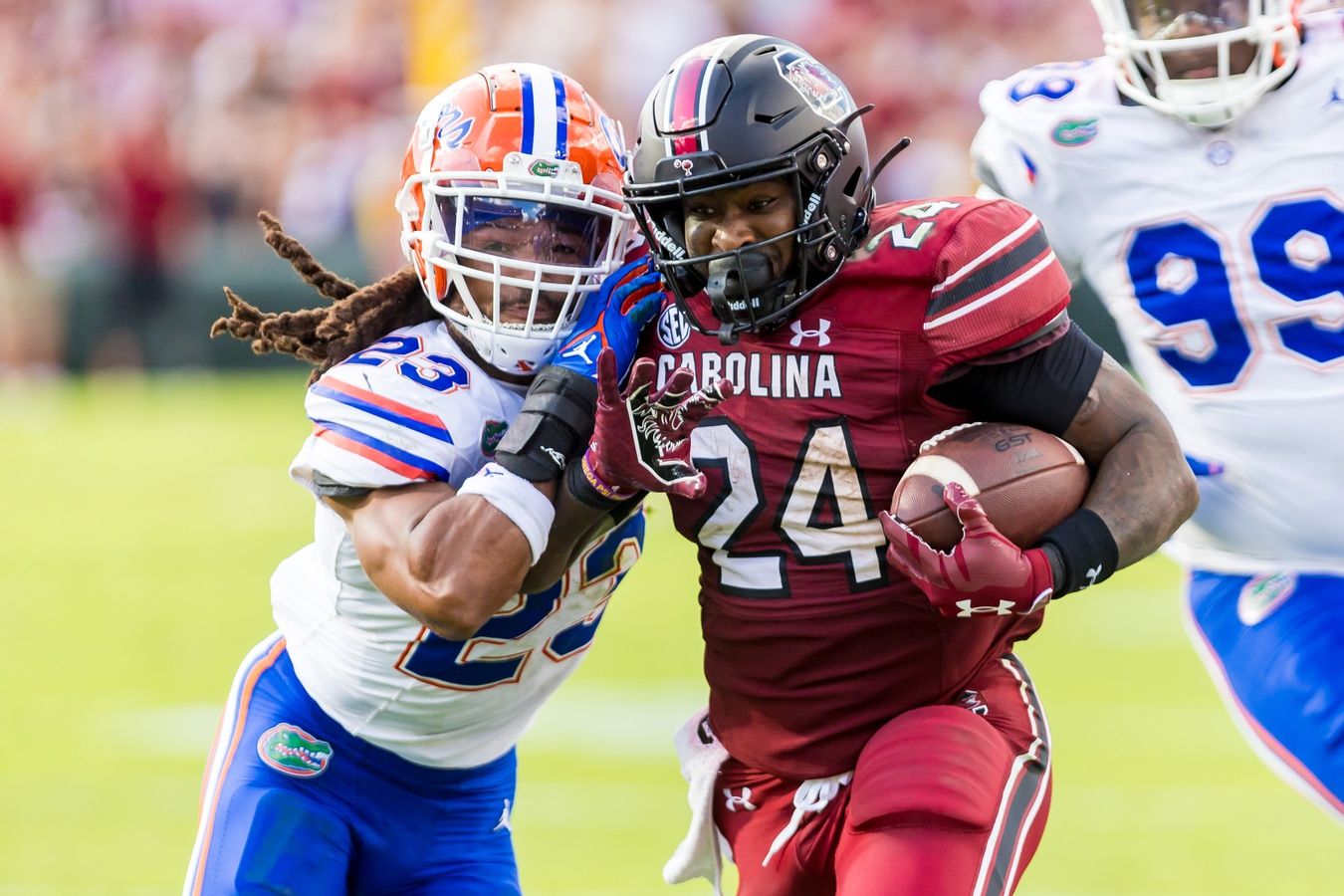 Florida Gators cornerback Jaydon Hill (23) tackles South Carolina Gamecocks running back Mario Anderson (24) in the second quarter at Williams-Brice Stadium.