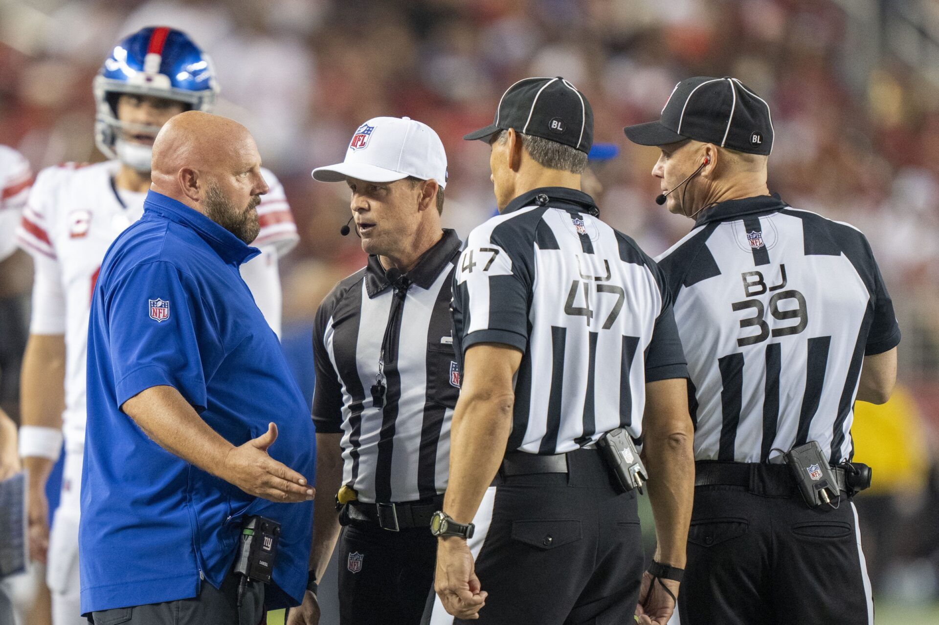 Brian Daboll (left) talks to the referees during the third quarter against the San Francisco 49ers at Levi's Stadium.