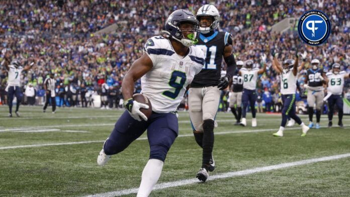 Kenneth Walker III (9) rushes for a touchdown against the Carolina Panthers during the fourth quarter at Lumen Field.