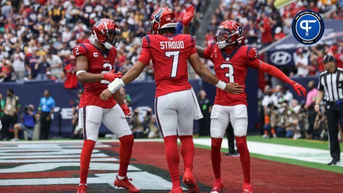 Houston Texans quarterback C.J. Stroud (7) celebrates with wide receiver Robert Woods (2) and wide receiver Tank Dell (3) after a touchdown during the game against the Pittsburgh Steelers at NRG Stadium.