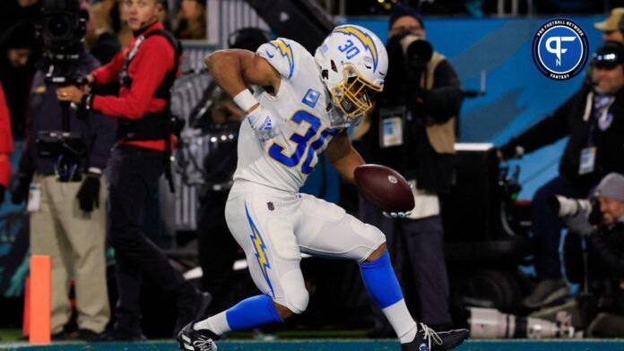 Los Angeles Chargers running back Austin Ekeler (30) celebrates a touchdown score during the first quarter of an NFL first round playoff football matchup Saturday, Jan. 14, 2023 at TIAA Bank Field in Jacksonville, Fla. The Jacksonville Jaguars edged the Los Angeles Chargers on a field goal 31-30.