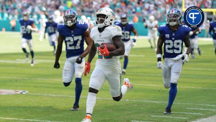 Miami Dolphins running back De'Von Achane (28) breaks free for a 76-yard touchdown run against the New York Giants during the first half of an NFL game at Hard Rock Stadium in Miami Gardens, October 8, 2023.