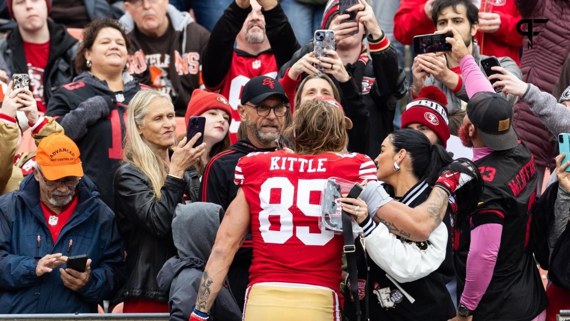 San Francisco 49ers TE George Kittle (85) visits with fans prior to a game.