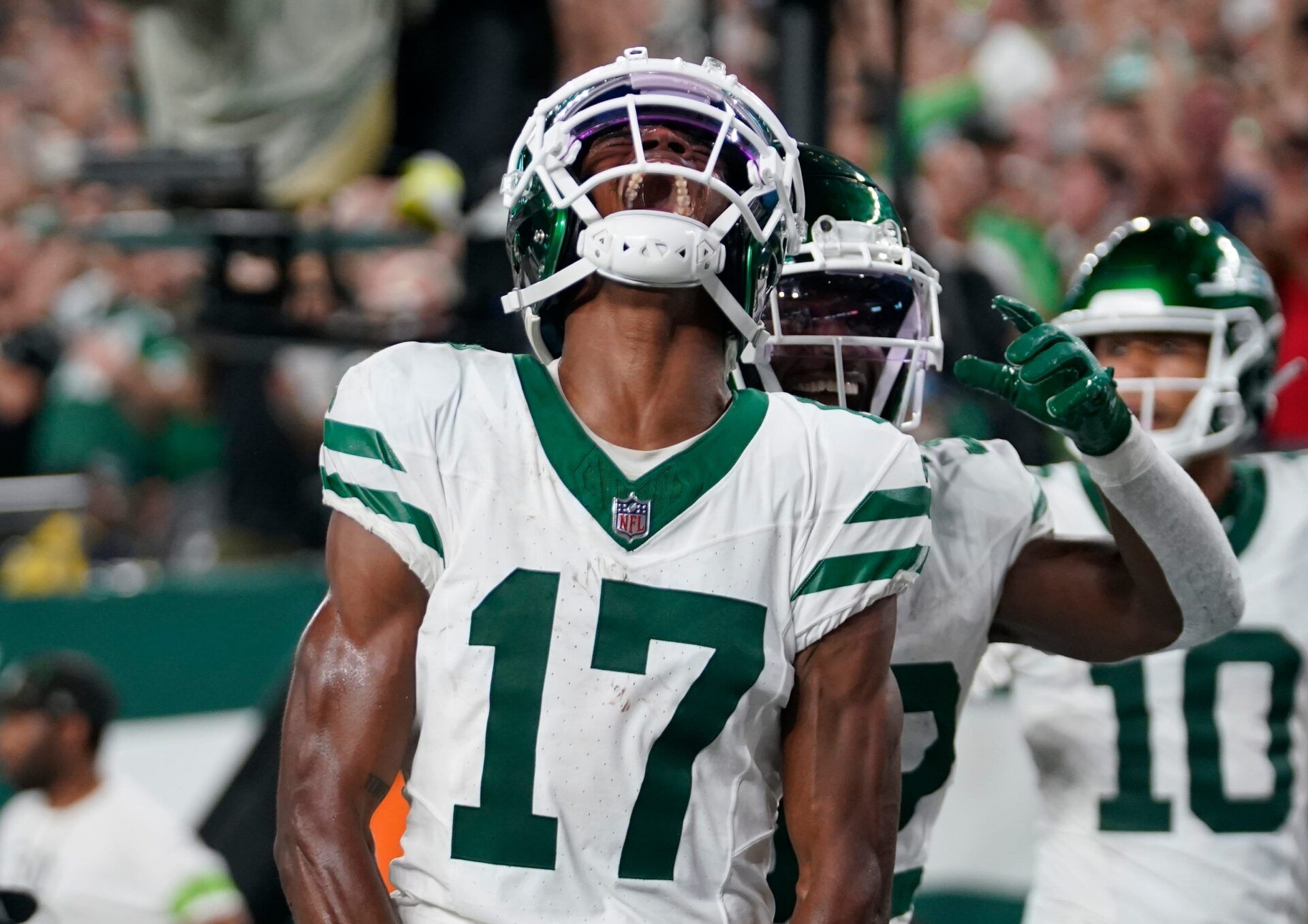 Garrett Wilson (17) celebrates his touchdown catch in the second half.