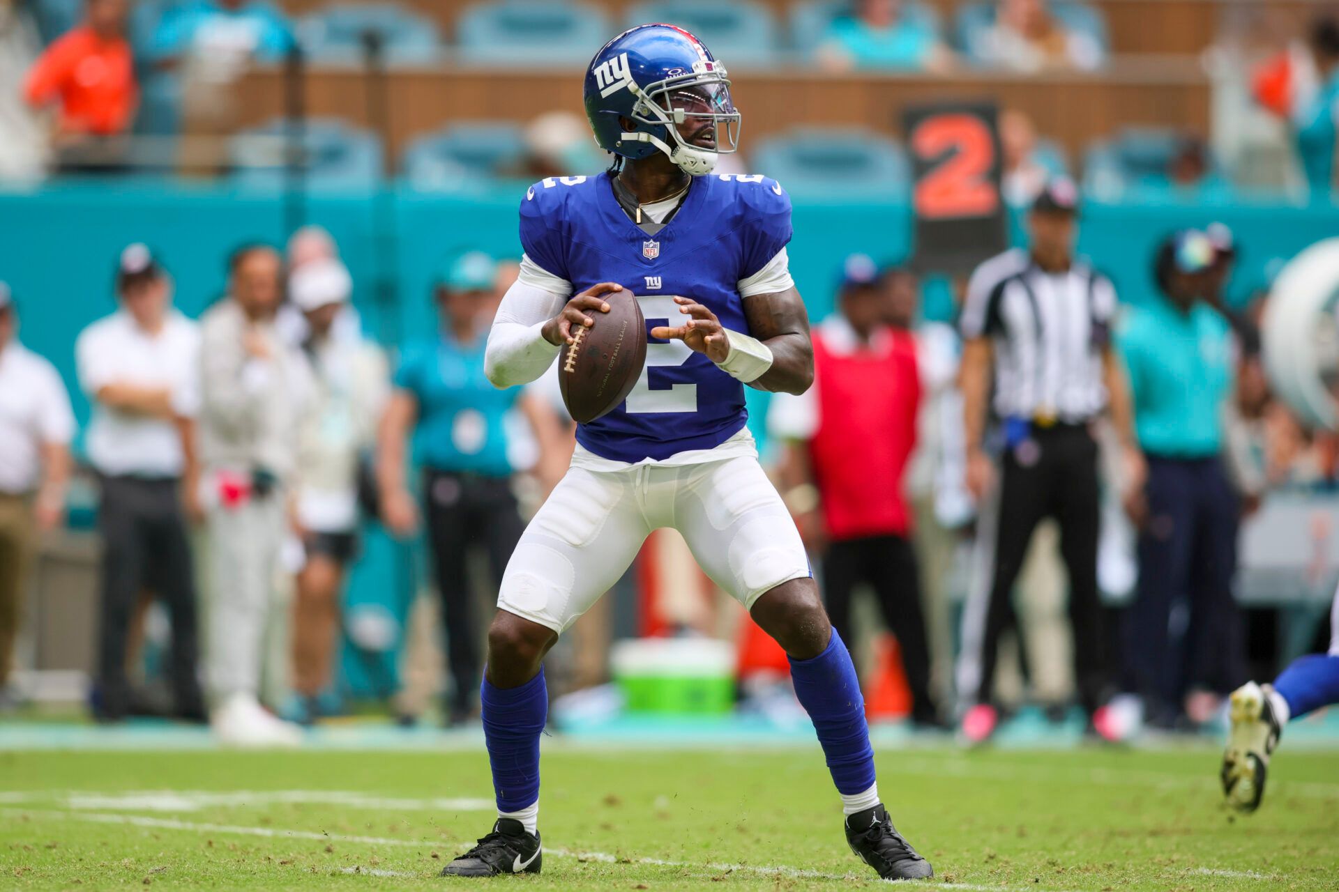 New York Giants quarterback Tyrod Taylor (2) looks for a passing option against the Miami Dolphins during the fourth quarter at Hard Rock Stadium.