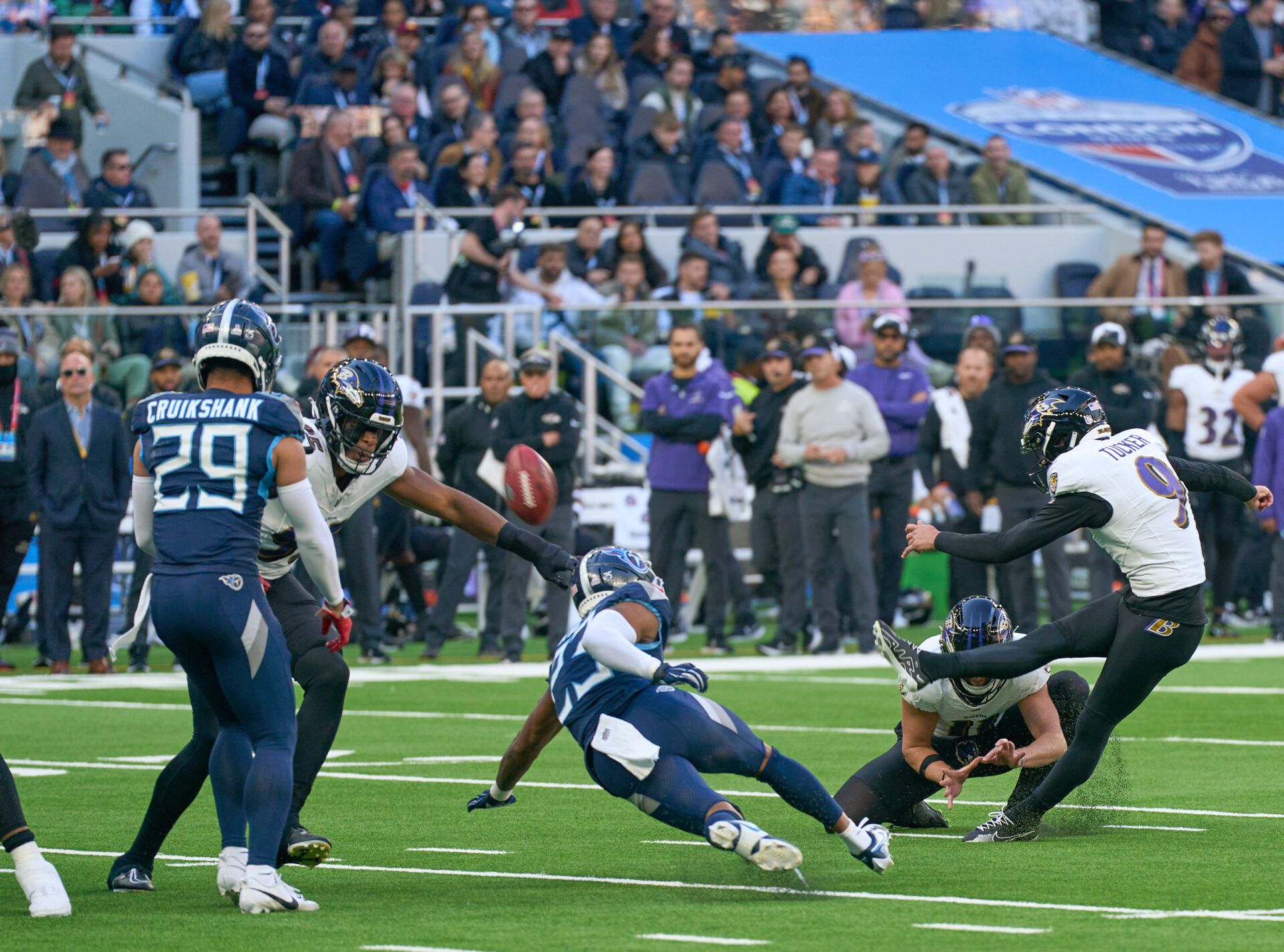 Baltimore Ravens place kicker Justin Tucker (9) kicks the points during the first half of an NFL International Series game at Tottenham Hotspur Stadium.