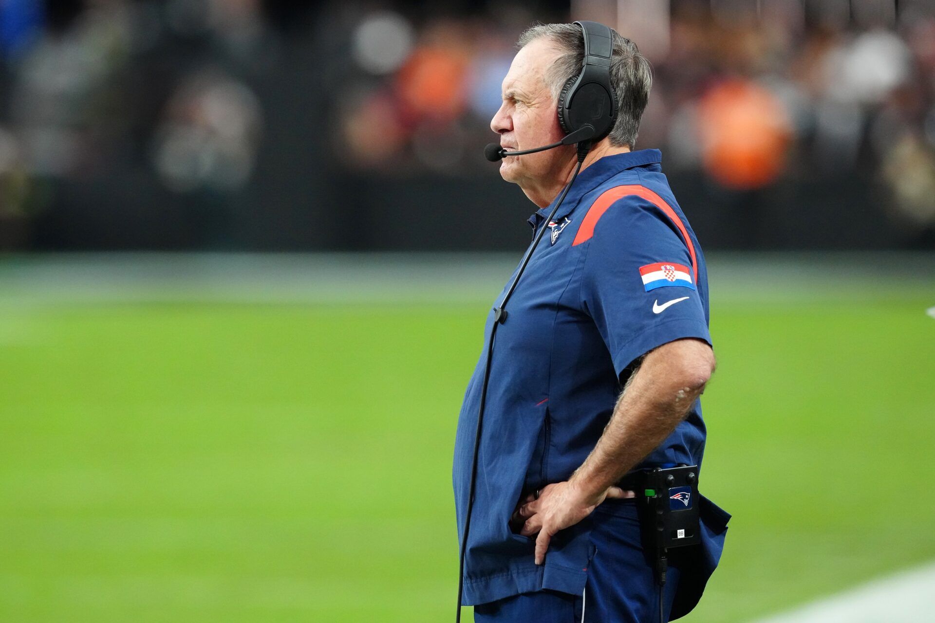 Bill Belichick watches play between the Patriots and the Las Vegas Raiders during the fourth quarter at Allegiant Stadium.