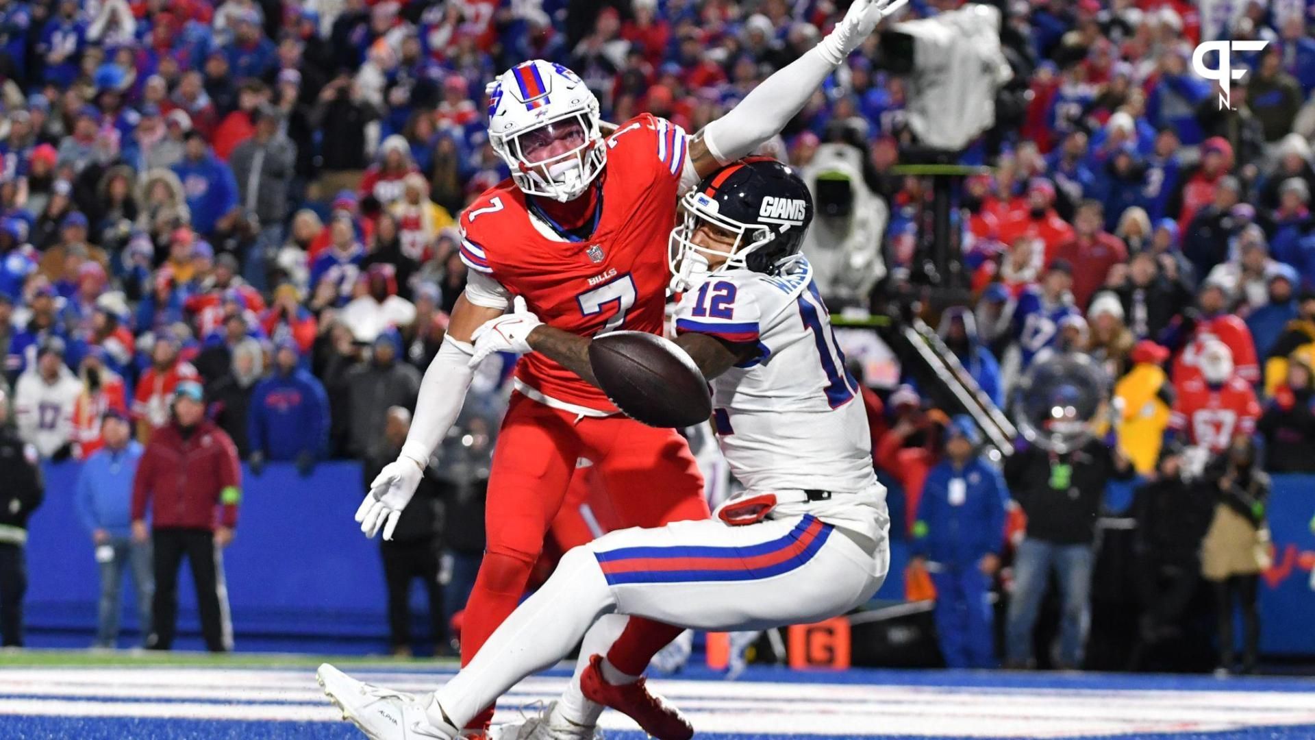 Buffalo Bills cornerback Taron Johnson (7) breaks up a pass in the endzone to New York Giants tight end Darren Waller (12) on the last play of the game at Highmark Stadium.