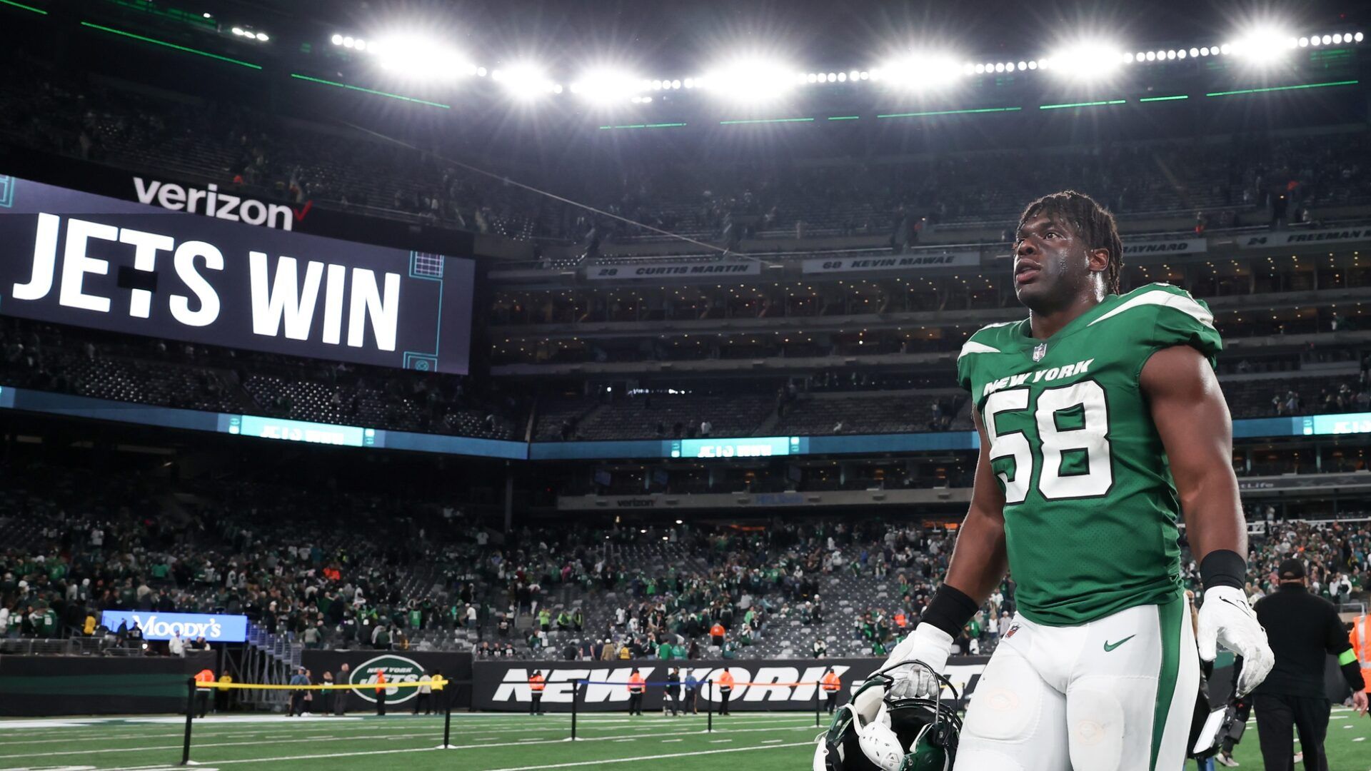 Carl Lawson (58) on the field after defeating the Philadelphia Eagles at MetLife Stadium.