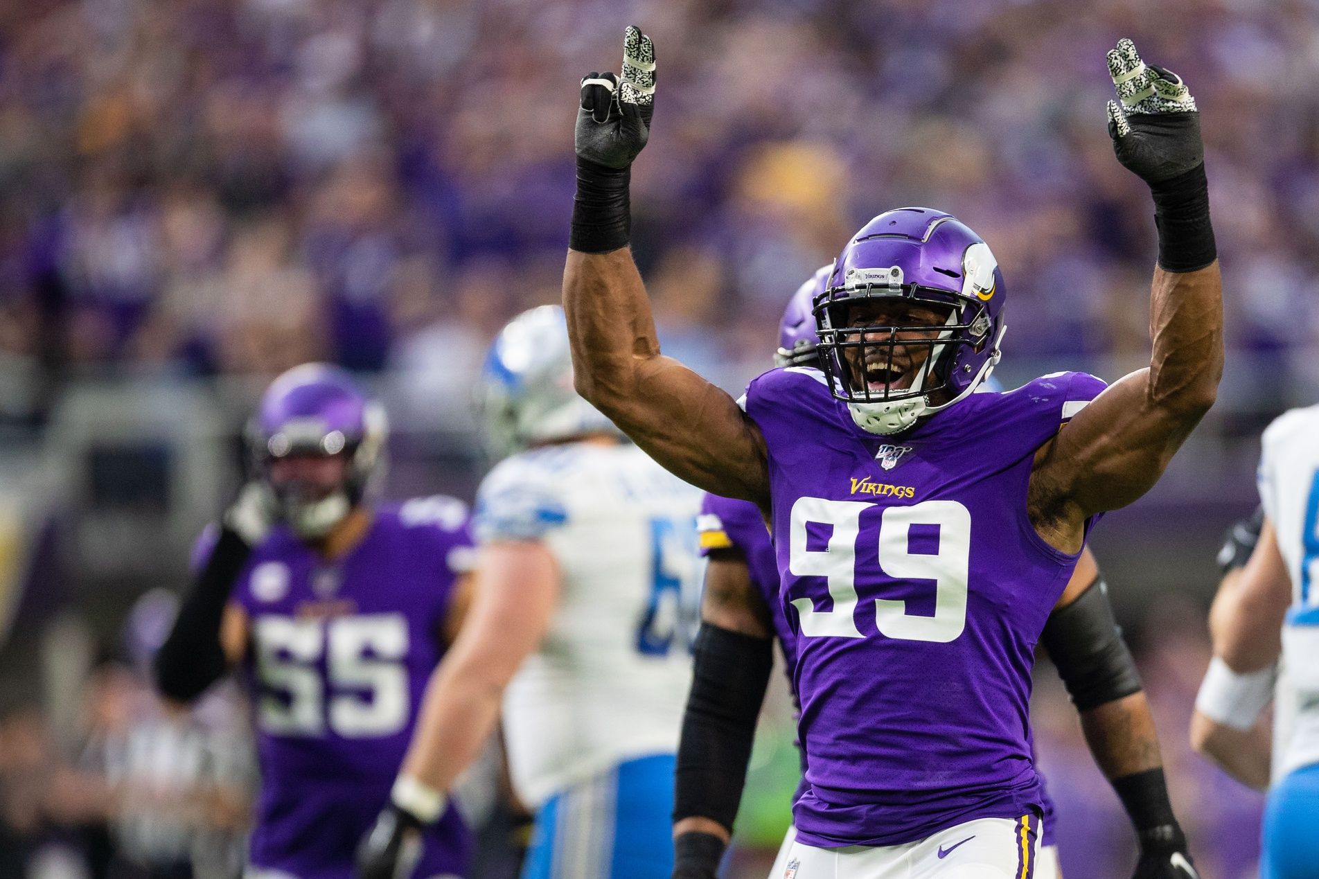 Danielle Hunter (99) celebrates after sacking Detroit Lions quarterback David Blough (not pictured) during the first quarter at U.S. Bank Stadium.