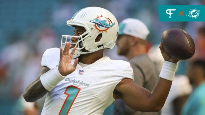 Tua Tagovailoa (1) throws the football during warmups prior to the game against the Carolina Panthers at Hard Rock Stadium.