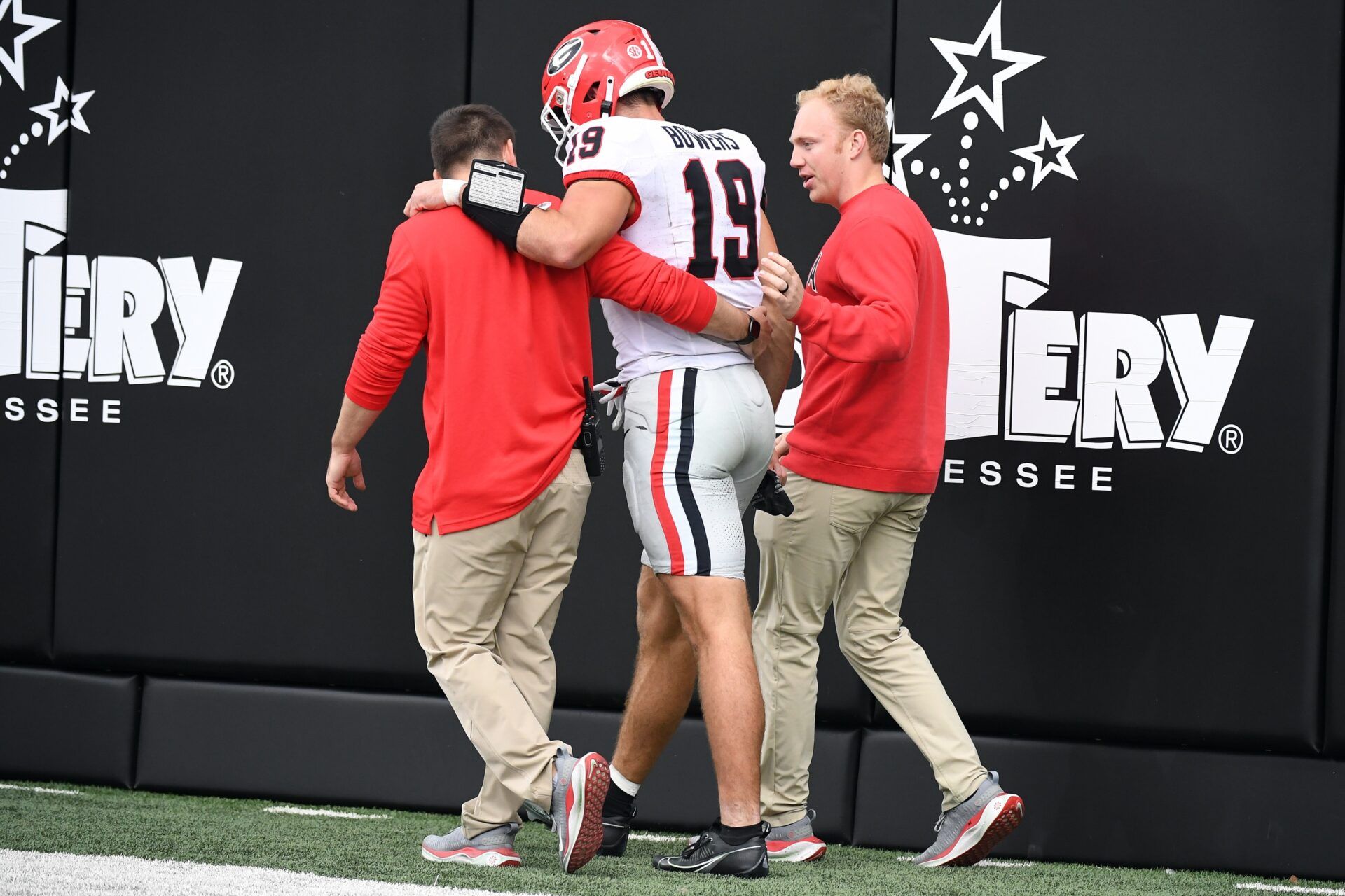 Brock Bowers (19) walks off the field after an injury during the first half against the Vanderbilt Commodores at FirstBank Stadium.