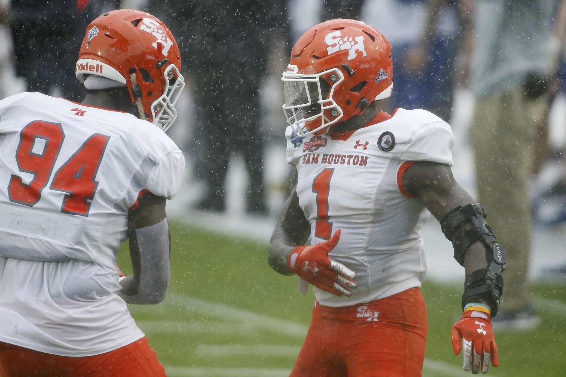 Sam Houston State LB Trevor Williams (1) and DL Jevon Leon (94) celebrate after a play.