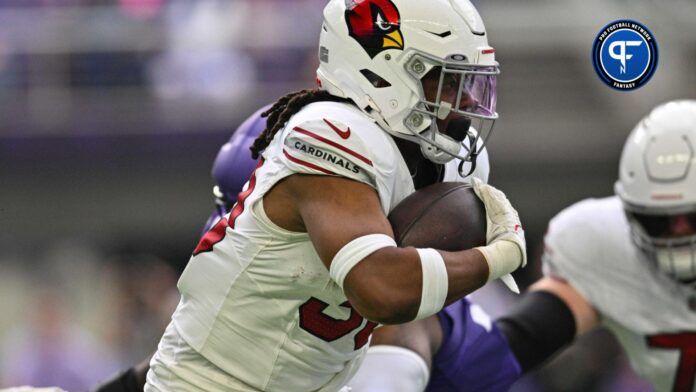 Arizona Cardinals RB Keaontay Ingram (30) runs the ball against the Minnesota Vikings.