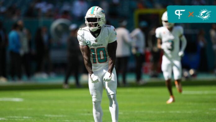 Tyreek Hill (10) runs onto the field prior to the game against the Carolina Panthers at Hard Rock Stadium.