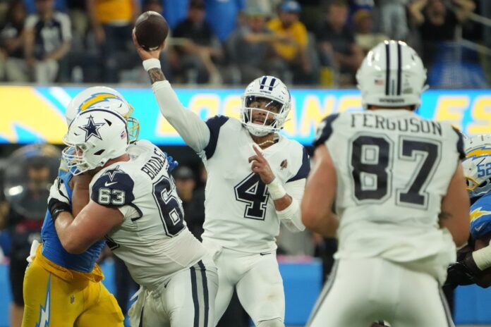 Dallas Cowboys quarterback Dak Prescott (4) throws the ball against the Los Angeles Chargers in the second half at SoFi Stadium.