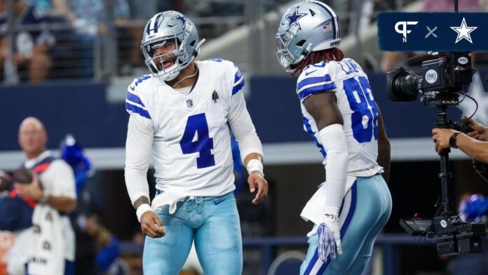 Dallas Cowboys quarterback Dak Prescott (4) celebrates with Dallas Cowboys wide receiver CeeDee Lamb (88) after throwing a touchdown pass during the first quarter against the New England Patriots at AT&T Stadium.