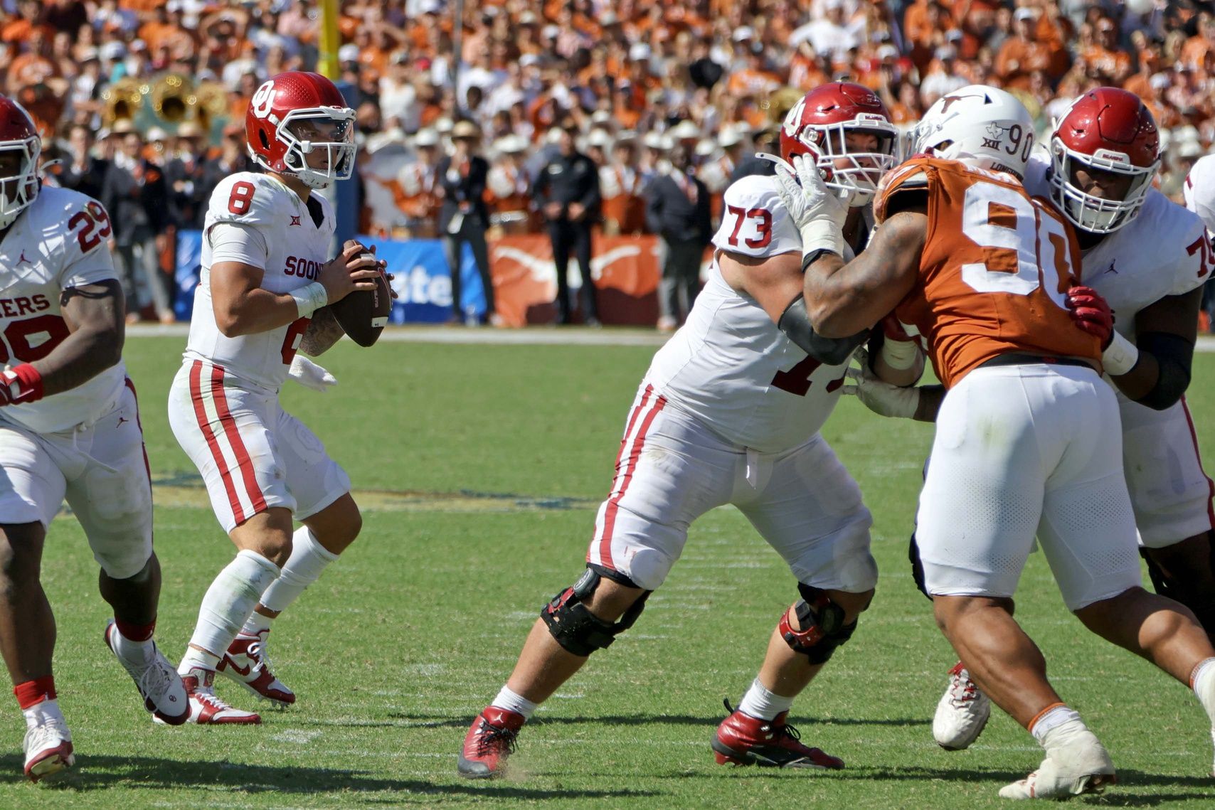 Oklahoma Sooners quarterback Dillon Gabriel (8) drops back to pass during the Red River Rivalry college football game between the University of Oklahoma Sooners (OU) and the University of Texas (UT) Longhorns.