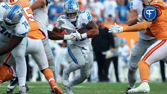 Detroit Lions RB Craig Reynolds (13) runs through a hole against the Tampa Bay Buccaneers.