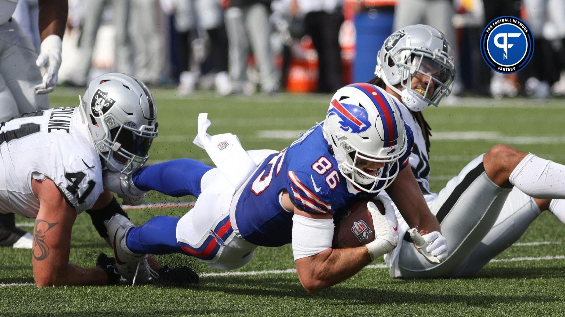 Buffalo Bills TE Dalton Kincaid (86) dives for extra yards against the Las Vegas Raiders.