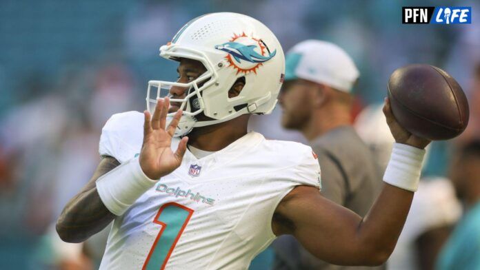 Miami Dolphins quarterback Tua Tagovailoa (1) throws the football during warmups prior to the game against the Carolina Panthers at Hard Rock Stadium.