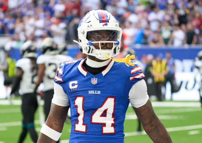 Buffalo Bills wide receiver Stefon Diggs (14) celebrates after scoring a touchdown during the first half of an NFL International Series game at Tottenham Hotspur Stadium.