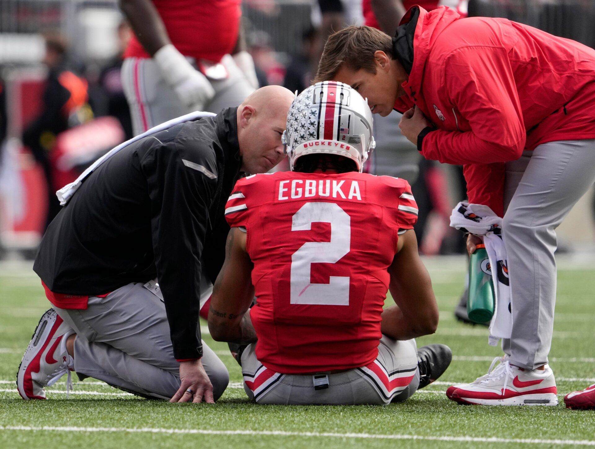 Emeka Egbuka (2) is attended to on the field during the second half of Saturday's NCAA Division I football game against the Maryland Terrapins.