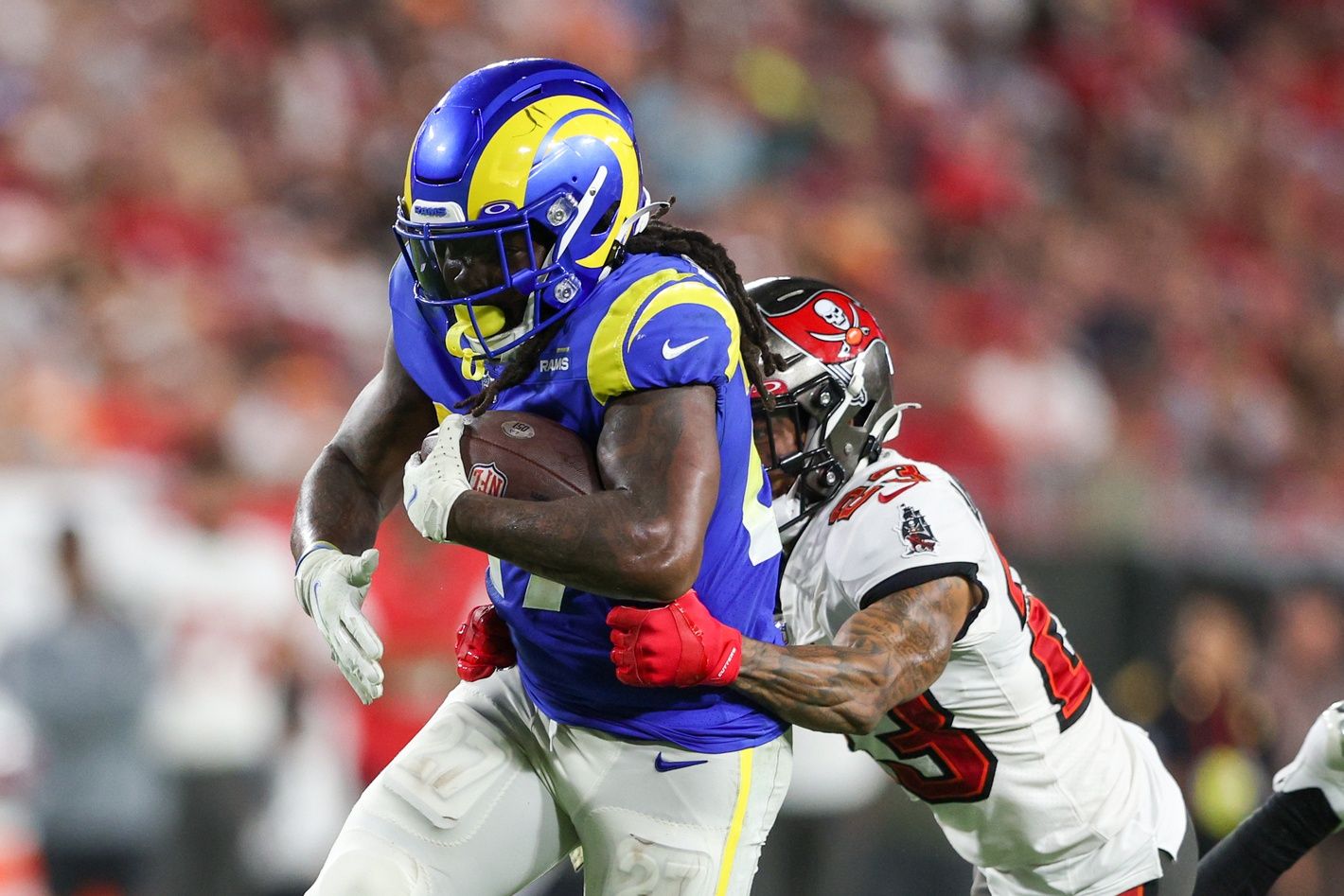 Darrell Henderson Jr. (27) is tackled by Tampa Bay Buccaneers cornerback Sean Murphy-Bunting (23) in the third quarter at Raymond James Stadium.