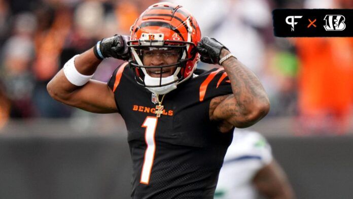 Ja'Marr Chase (1) reacts after catch in the second quarter during an NFL football game between the Seattle Seahawks and the Cincinnati Bengals.