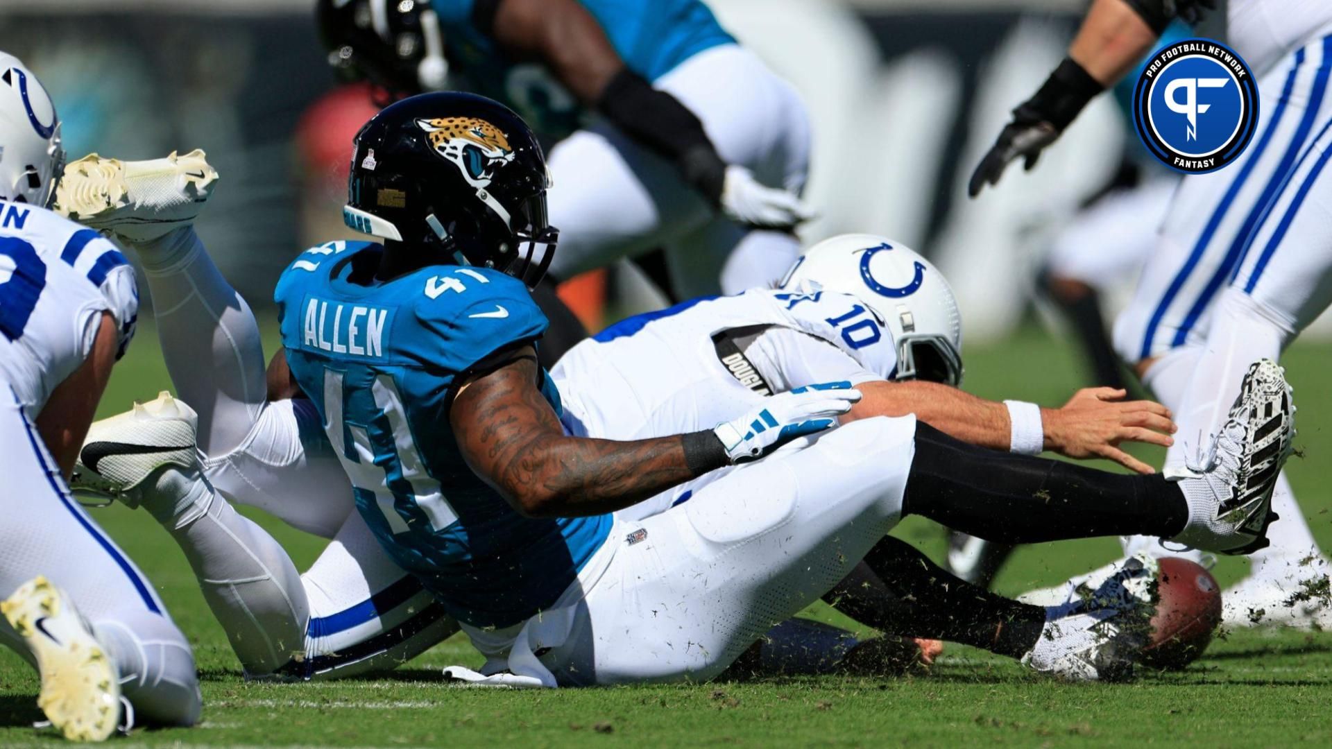 Jacksonville Jaguars linebacker Josh Allen (41) commits a fumble turnover against Indianapolis Colts quarterback Gardner Minshew (10) during the second quarter.