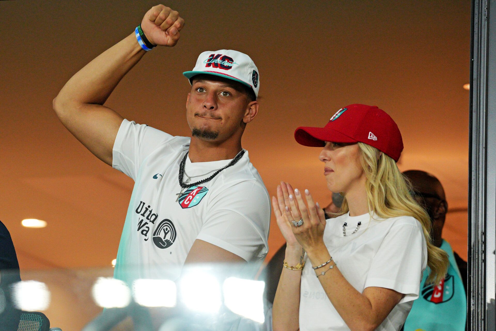 Aug 17, 2024; Kansas City, MO, USA; Patrick Mahomes and Brittany Mahomes cheer during the game between the Kansas City Current and Atletico De Madrid during The Women’s Cup at CPKC Stadium. Mandatory Credit: Jay Biggerstaff-USA TODAY Sports