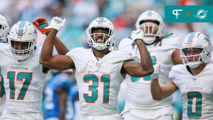 Miami Dolphins running back Raheem Mostert (31) celebrates with teammates after scoring a touchdown against the Carolina Panthers during the fourth quarter at Hard Rock Stadium.