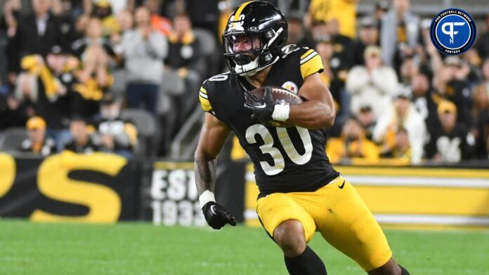 Jaylen Warren (30) runs the ball in the second quarter during a game against the Cleveland Browns at Acrisure Stadium.