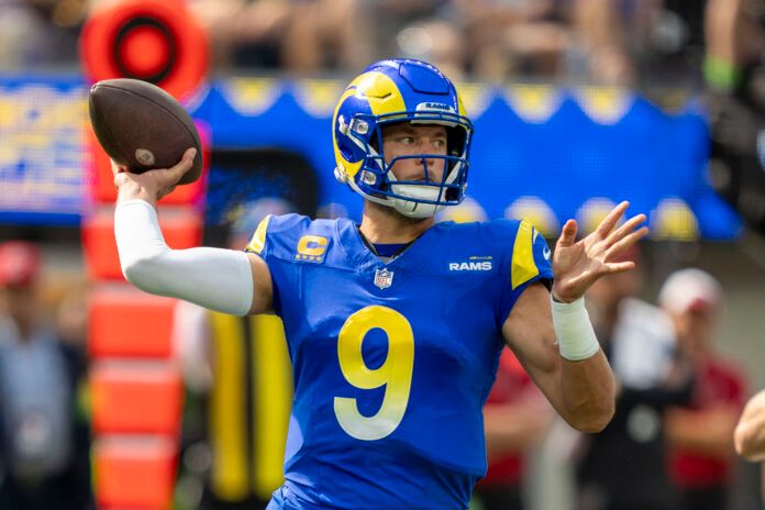 Los Angeles Rams quarterback Matthew Stafford (9) passes the football against the Arizona Cardinals during the first quarter at SoFi Stadium.