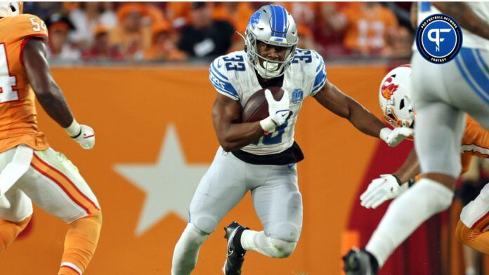 Detroit Lions running back Devine Ozigbo (33) runs with the ball against the Tampa Bay Buccaneers during the second half at Raymond James Stadium.