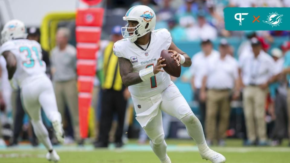 Miami Dolphins QB Tua Tagovailoa (1) rolls out to pass.