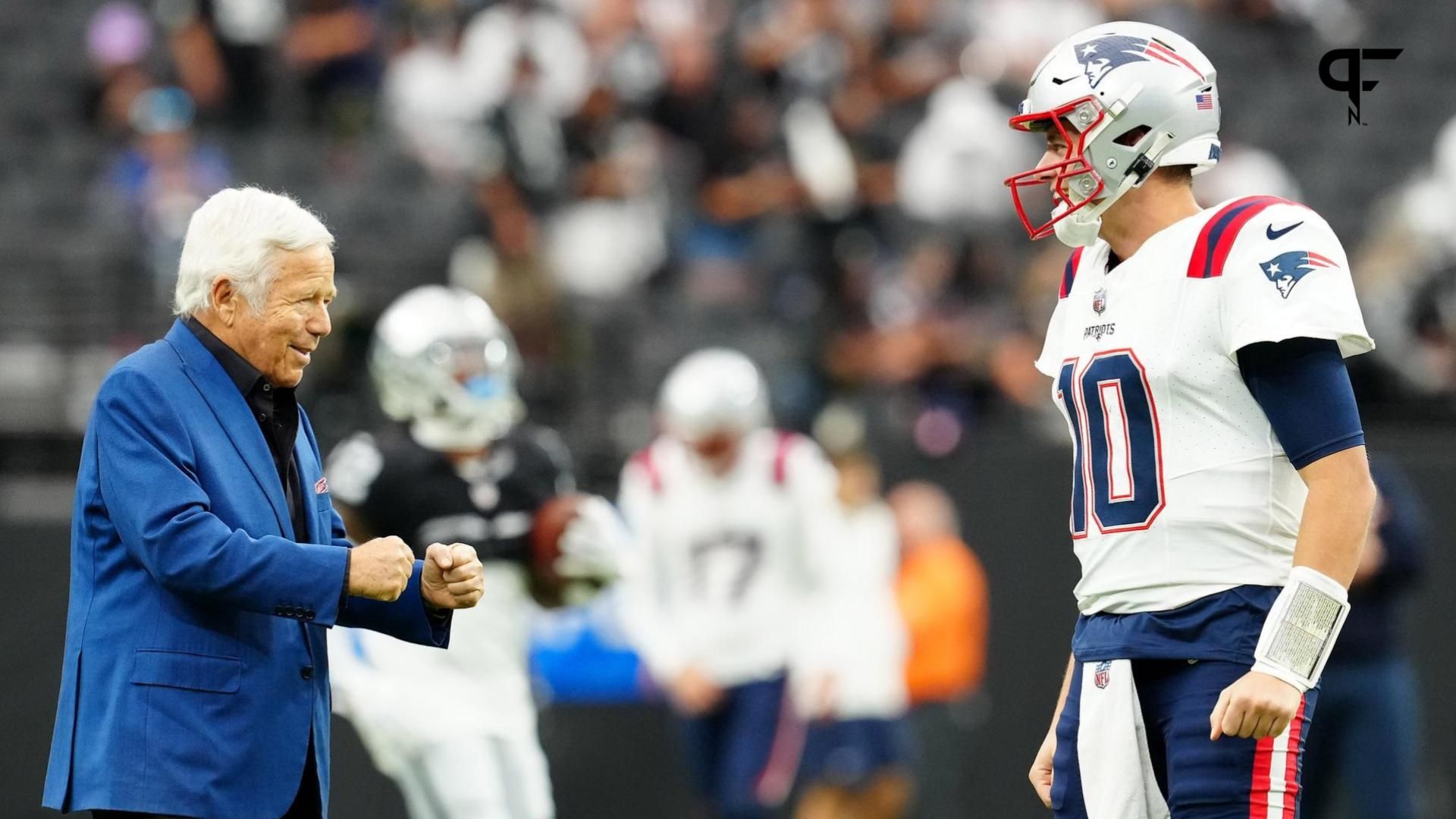 New England Patriots CEO Robert Kraft talks with New England Patriots quarterback Mac Jones (10) before the start of a game against the Las Vegas Raiders at Allegiant Stadium.