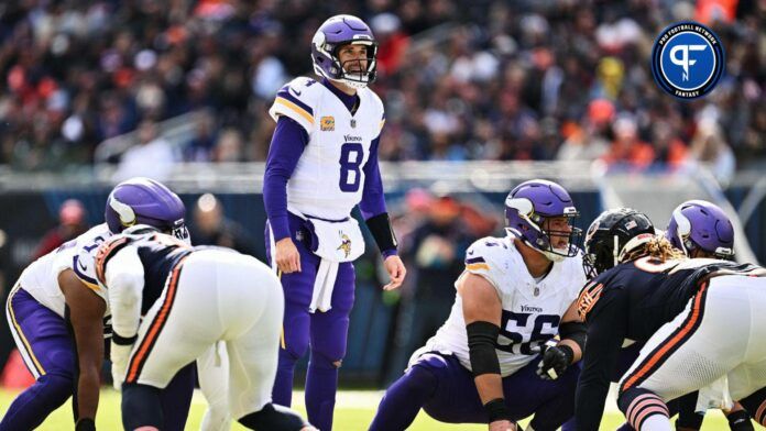 Minnesota Vikings quarterback Kirk Cousins (8) calls signals at the line against the Chicago Bears at Soldier Field.