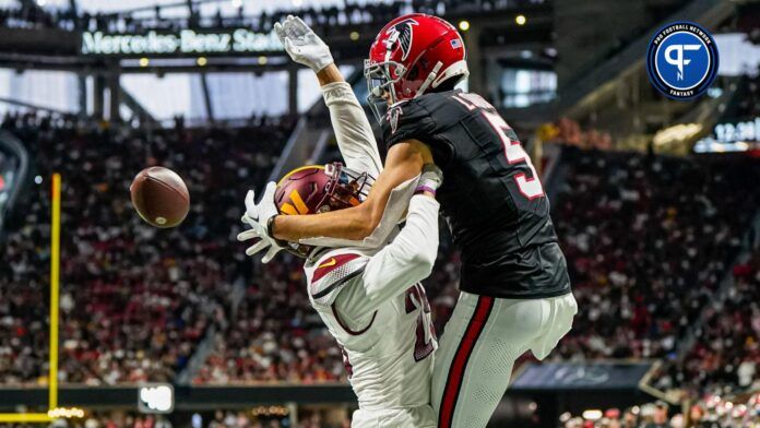 Washington Commanders cornerback Benjamin St-Juste (25) is called for pass interference on Atlanta Falcons wide receiver Drake London (5) on a two point conversion attempt during the second half at Mercedes-Benz Stadium.